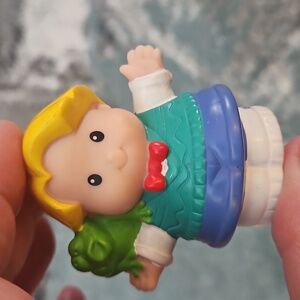 Fisher-Price Little People Eddie character holding a green frog